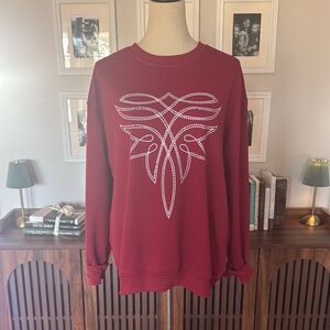 Red Sweatshirt with White Pattern Boot Stitch Graphic